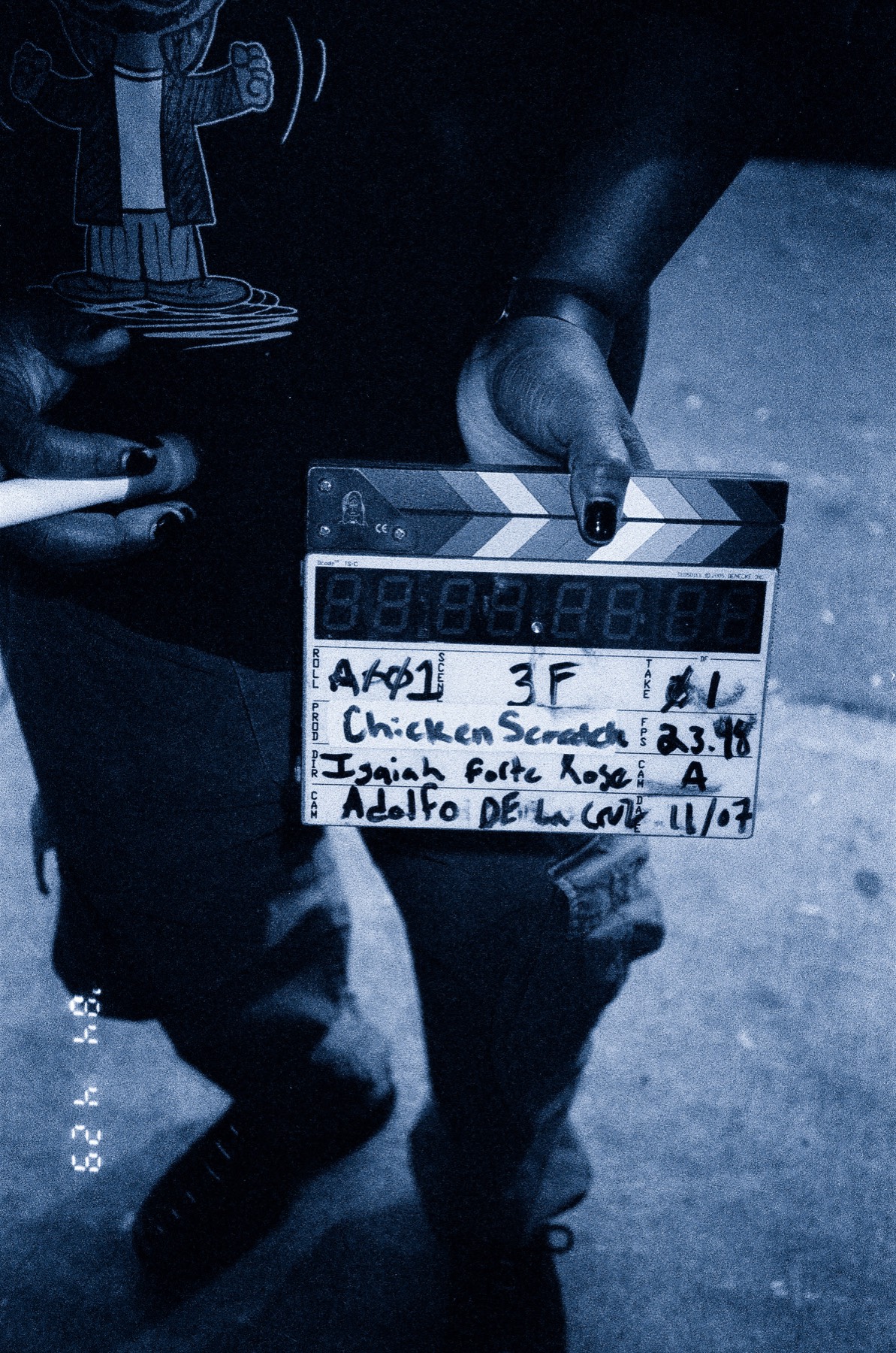 On set of Chicken Scratch